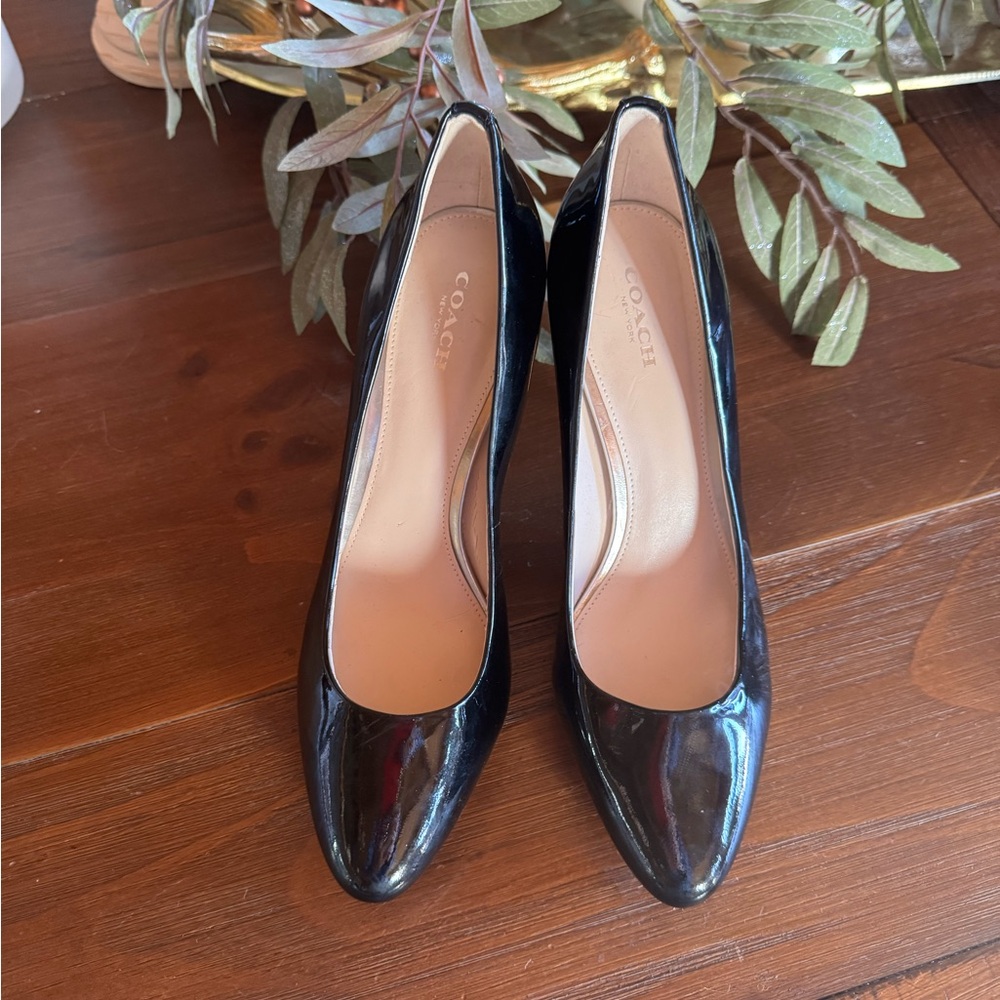 Coach patent leather pump. Size 8 1/2. Only worn a handful of times.